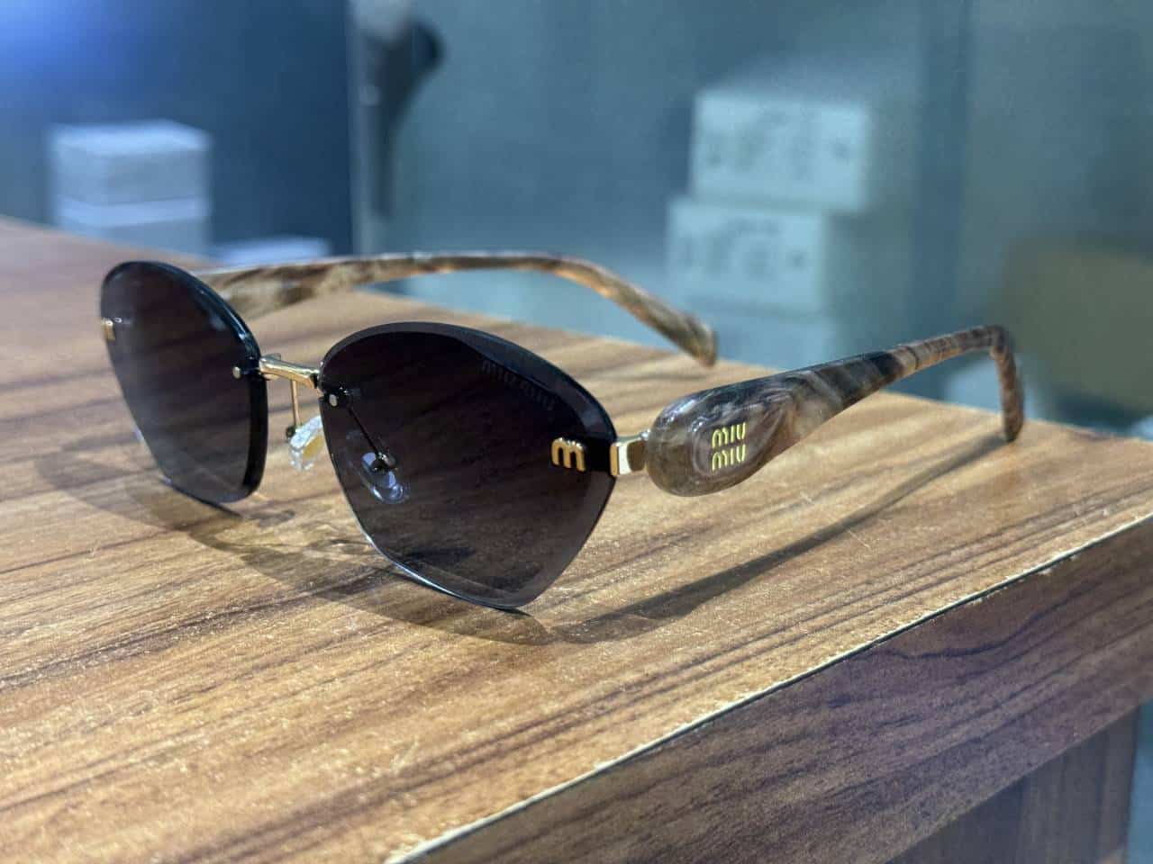 Miu Miu Brown Black LuXury Shade 49 Main image