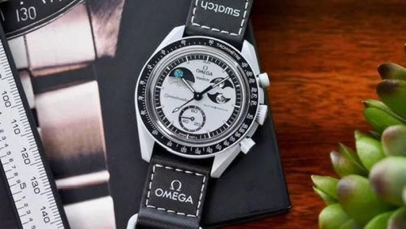 Omega speedmaster Swatch moon sun m Main image