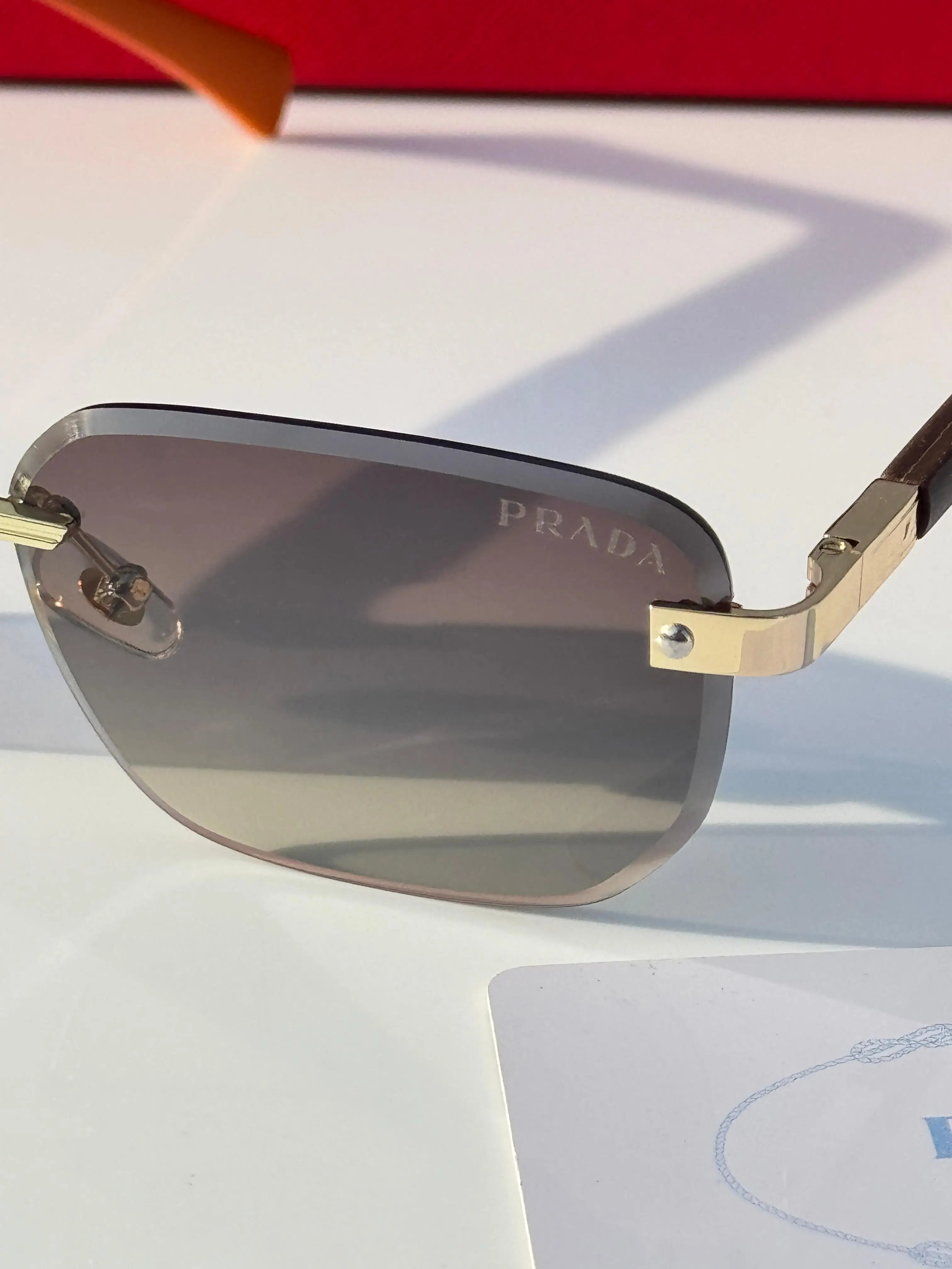 Prada_122_gold_brown Secondary image