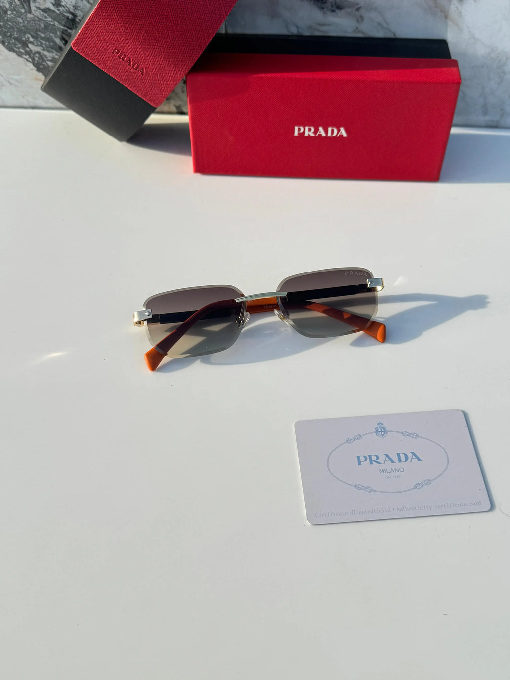 Prada_122_gold_brown