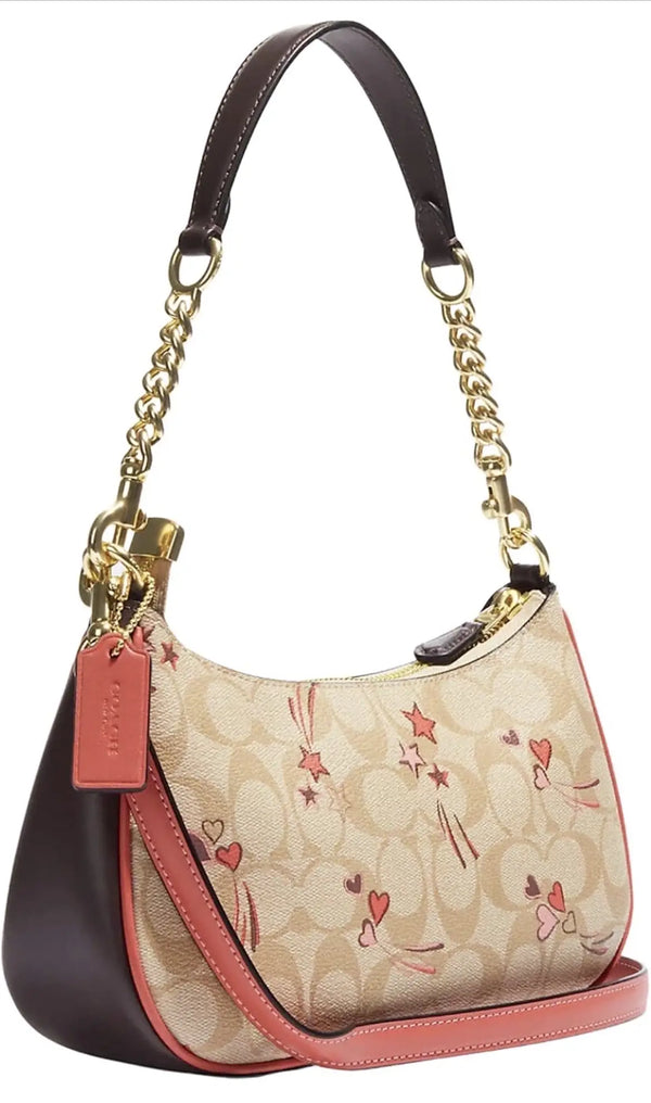 Coach Outlet Teri Shoulder Bag in Signature Canvas with Heart and Star Print with dust bag
