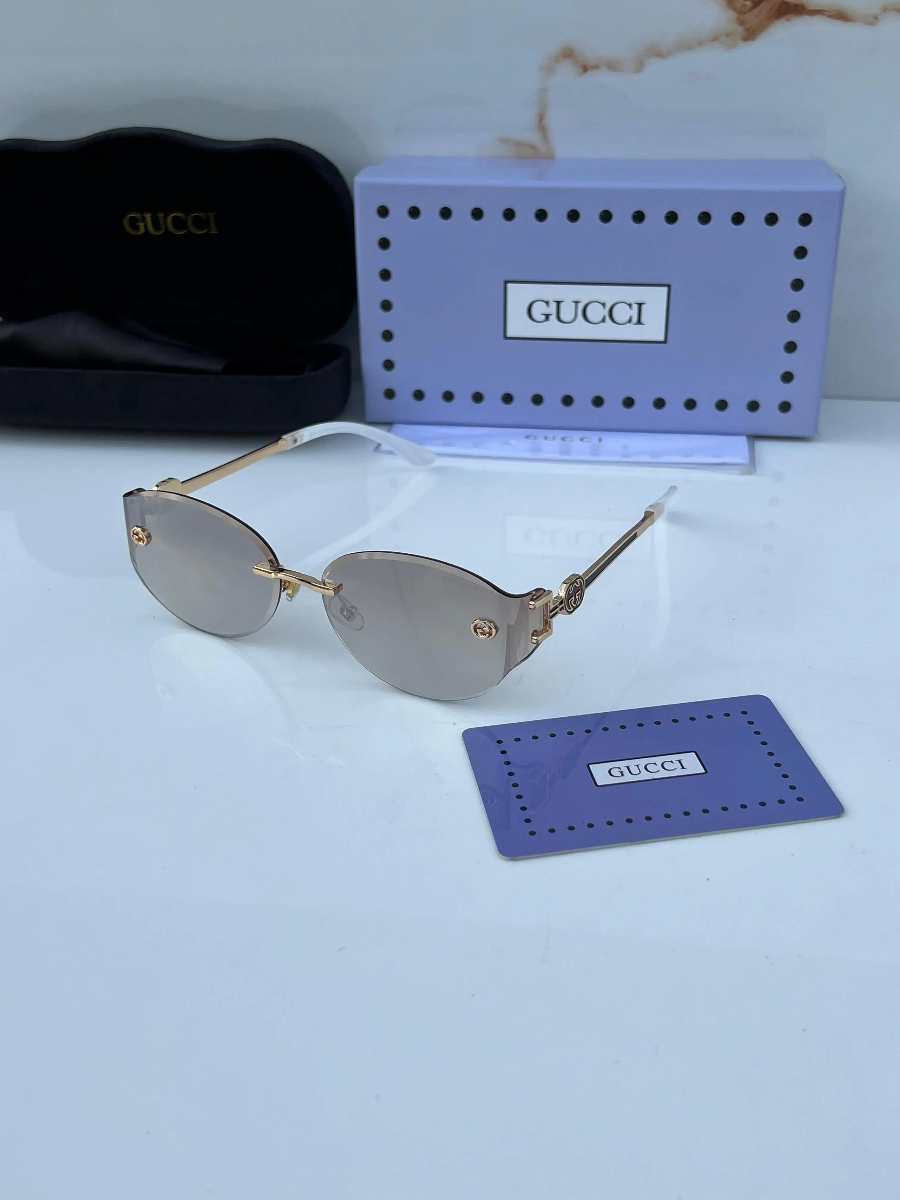 Gucci_993_gold_silver_ Main image