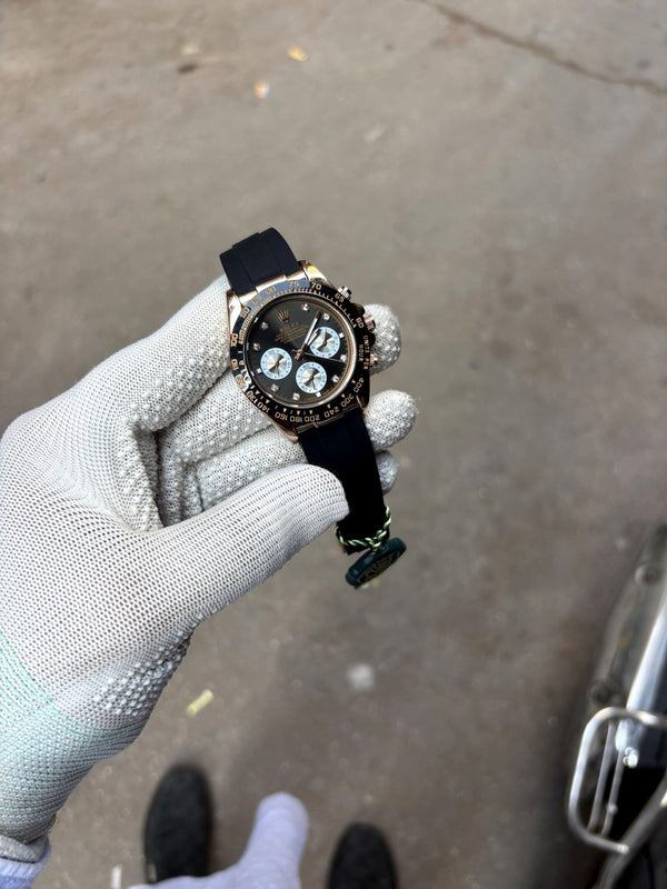 cosmograph daytona everose gold ceramic bezel black and sundust diamond dial oysterflex