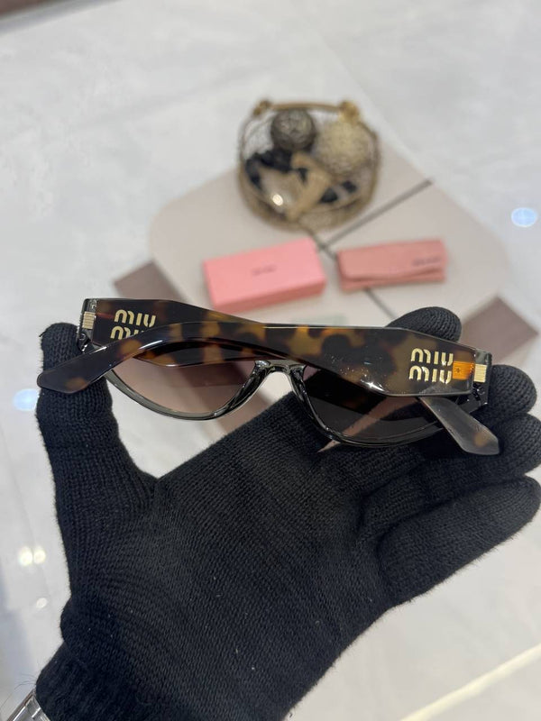 Miu_Miu_2945_Tiger_Grey