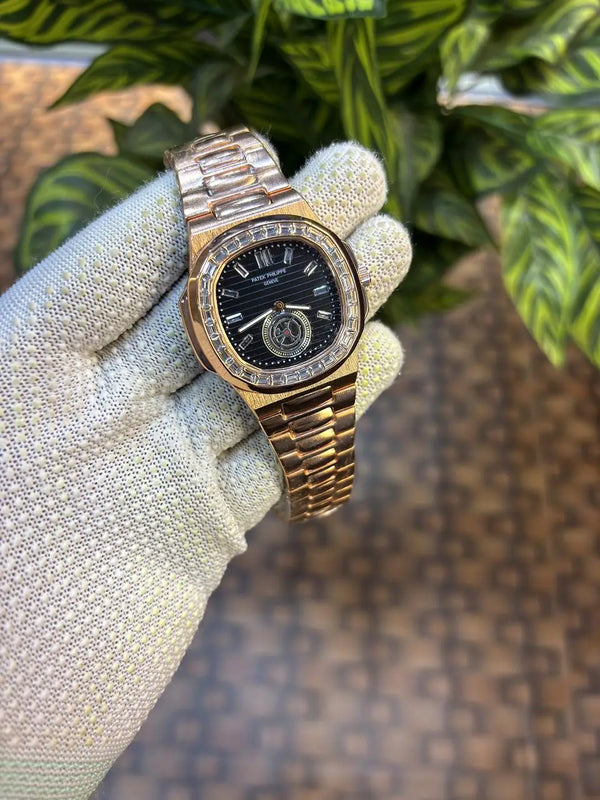Patek Philippe Nautilus baguette diamond-set bezel.