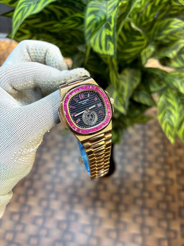 Patek Philippe Nautilus baguette diamond-set bezel.