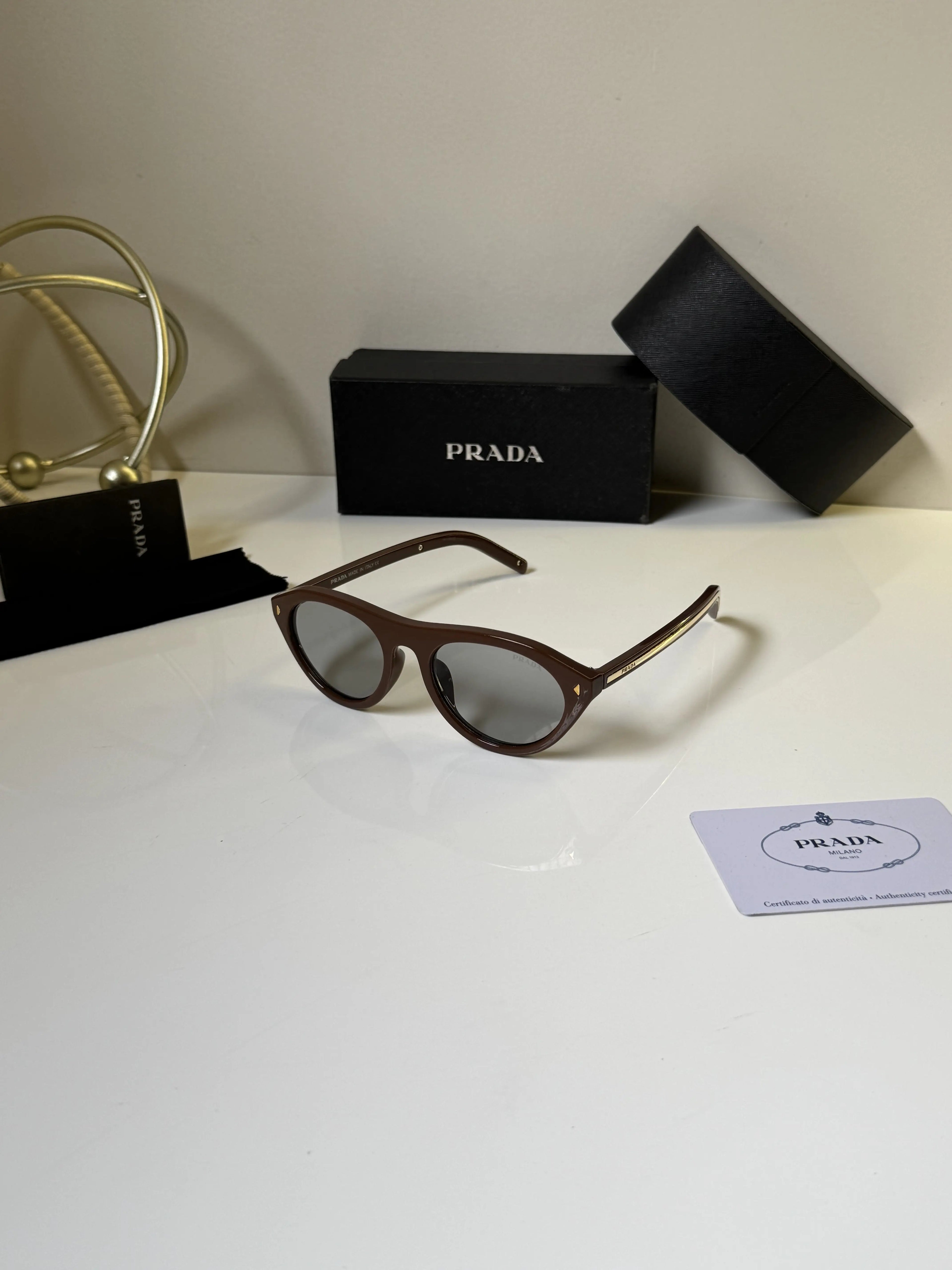 Prada_15S_Gold_Brown