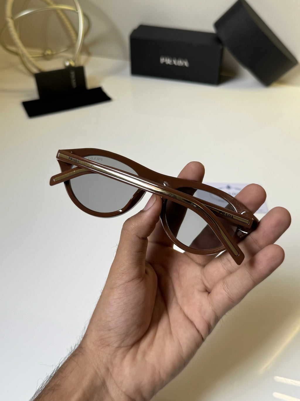 Prada_15S_Gold_Brown