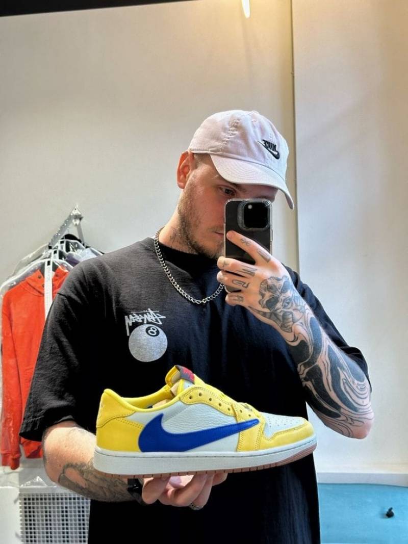 Travis Scott x Air Jordan 1 Retro Low OG SP Canary sneaker.