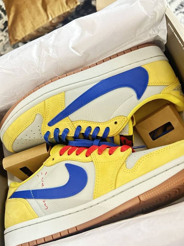 Travis Scott x Air Jordan 1 Retro Low OG SP Canary sneaker.