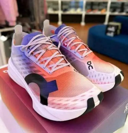 On Cloudboom Strike White Flame with cloud extra insole