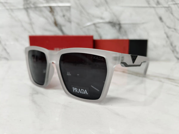 PRADA 0626 TRANSPARENT GREY METAL LOGO 
