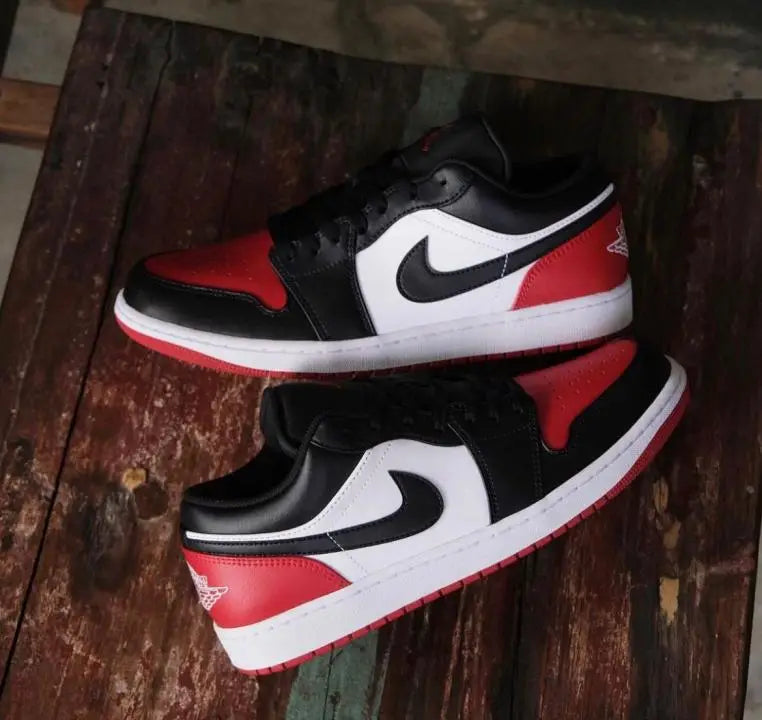 Nik_e Aur Jordan Retro 1 Low Bred Toe